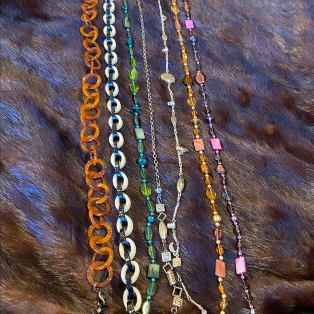 Lot of 7 eye glass holders. All unique